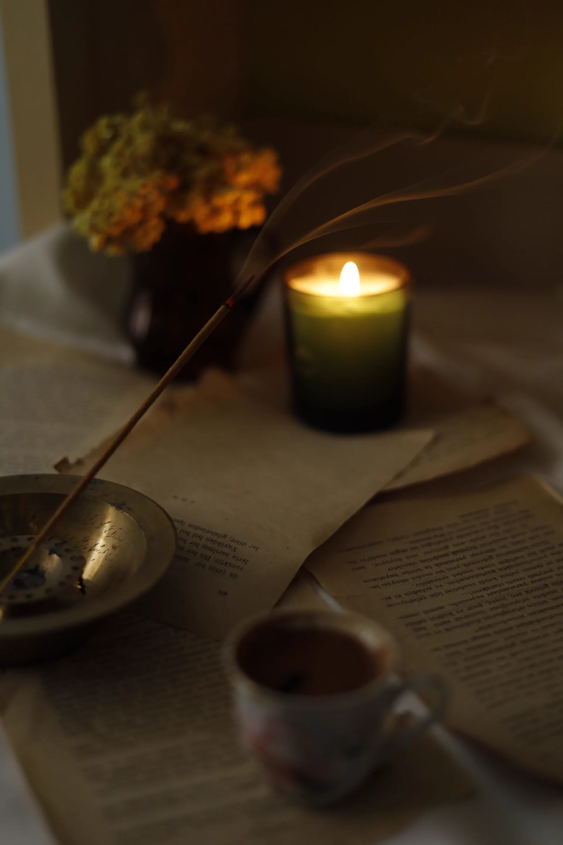 A quiet moment, a cup set down near a window